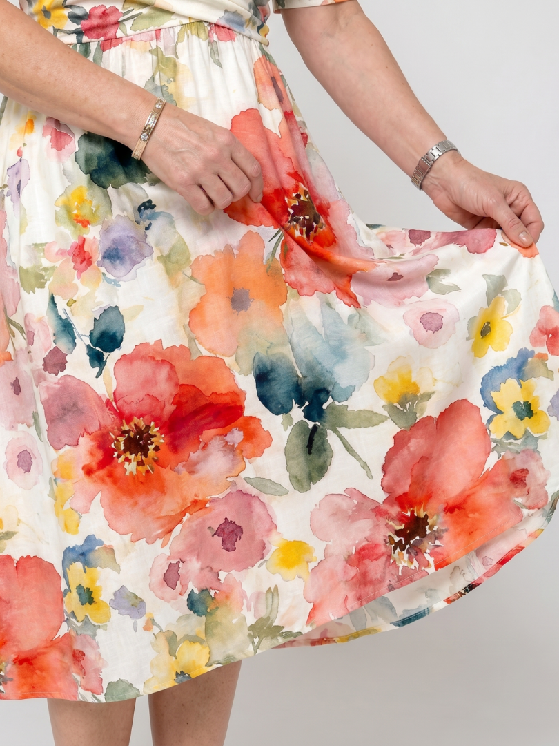 Corinne | Floral Print Short Sleeve V Neck Midi Dress
