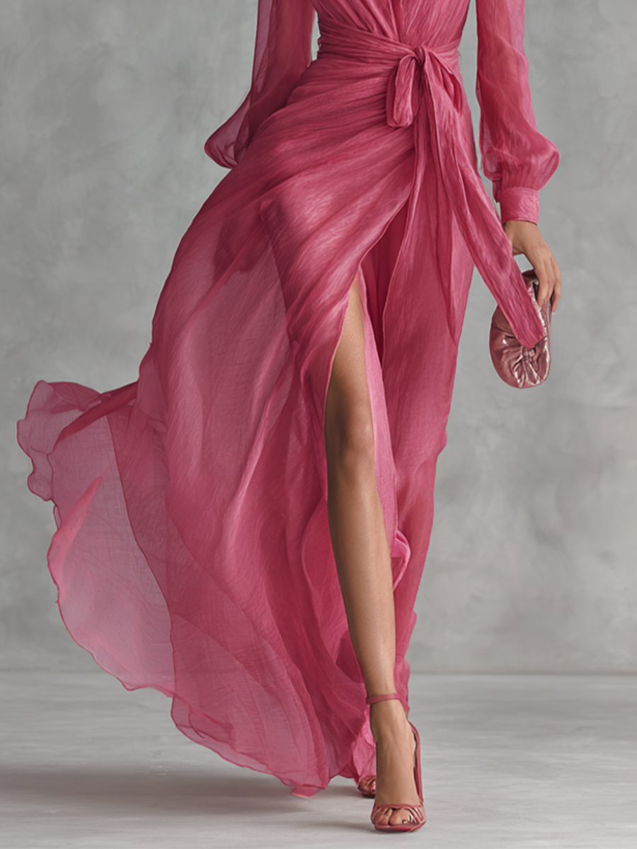 Elegant long women's dress in pearl pink chiffon with V-neck and waist belt